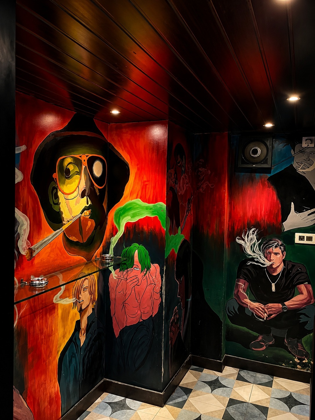 Deep plush lounge booth seating with velvet upholstery and low ambient table lighting at Big Bull Cafe